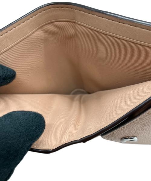 COACH（コーチ）COACH (コーチ) 3つ折り財布 ベージュの古着・服飾アイテム