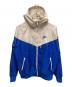 NIKE（ナイキ）の古着「NSW HERITAGE ES WINDRUNNER ウインドブレーカー」｜ベージュ×ブルー