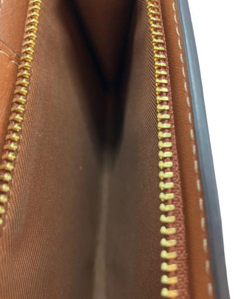 COACH（コーチ）COACH (コーチ) ミディアム コーナー ジップ ウォレット ブラウンの古着・服飾アイテム