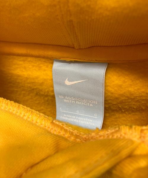 NIKE（ナイキ）NIKE (ナイキ) NOCTA (ノクタ) プルオーバーパーカー イエロー サイズ:Lの古着・服飾アイテム
