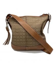 COACH（コーチ）の古着「シグネチャー 総柄 タッセル ショルダーバッグ」｜ブラウン