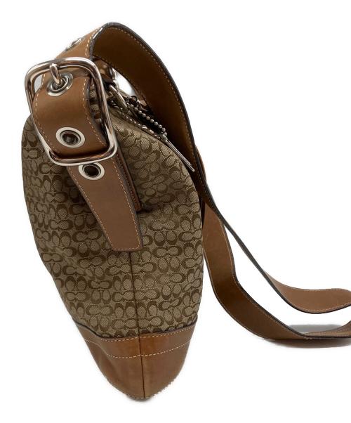 COACH（コーチ）COACH (コーチ) シグネチャー 総柄 タッセル ショルダーバッグ ブラウンの古着・服飾アイテム