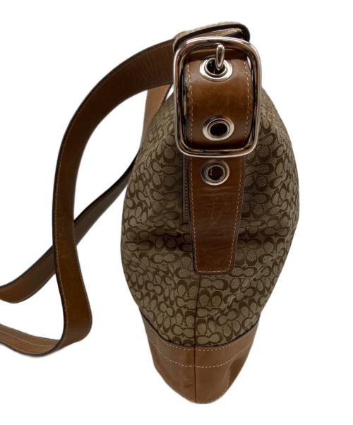 COACH（コーチ）COACH (コーチ) シグネチャー 総柄 タッセル ショルダーバッグ ブラウンの古着・服飾アイテム