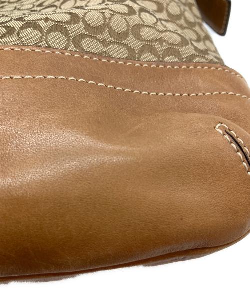 COACH（コーチ）COACH (コーチ) シグネチャー 総柄 タッセル ショルダーバッグ ブラウンの古着・服飾アイテム