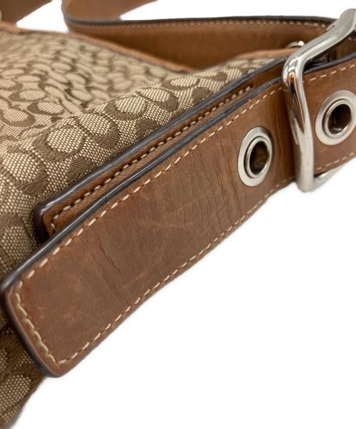 COACH（コーチ）COACH (コーチ) シグネチャー 総柄 タッセル ショルダーバッグ ブラウンの古着・服飾アイテム