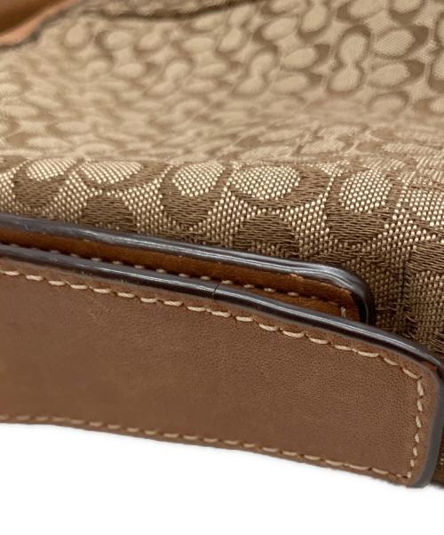 COACH（コーチ）COACH (コーチ) シグネチャー 総柄 タッセル ショルダーバッグ ブラウンの古着・服飾アイテム