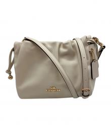 COACH（コーチ）の古着「フェイ ドローストリングバッグ」｜アイボリー