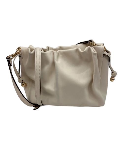 COACH（コーチ）COACH (コーチ) フェイ ドローストリングバッグ アイボリーの古着・服飾アイテム