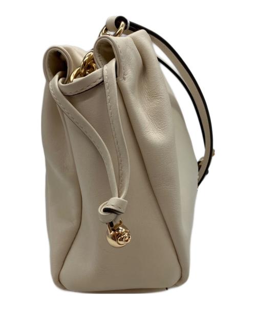 COACH（コーチ）COACH (コーチ) フェイ ドローストリングバッグ アイボリーの古着・服飾アイテム