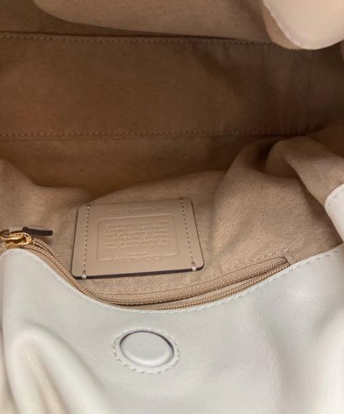COACH（コーチ）COACH (コーチ) フェイ ドローストリングバッグ アイボリーの古着・服飾アイテム