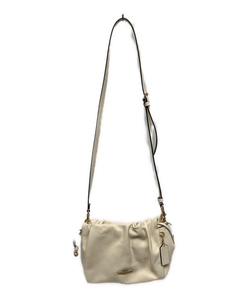 COACH（コーチ）COACH (コーチ) フェイ ドローストリングバッグ アイボリーの古着・服飾アイテム