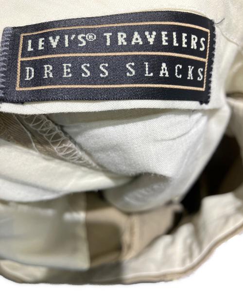 LEVI'S（リーバイス）LEVI'S (リーバイス) Travelers ドレススラックスパンツ スラックス ベージュ サイズ:W32の古着・服飾アイテム