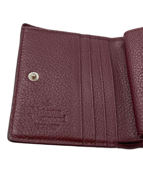 Vivienne Westwood（ヴィヴィアンウエストウッド）Vivienne Westwood (ヴィヴィアンウエストウッド) 2つ折り財布 ボルドーの古着・服飾アイテム