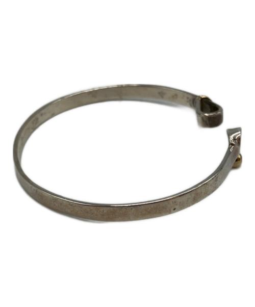 TIFFANY & Co.（ティファニー）TIFFANY & Co. (ティファニー) ラブノット フック&アイバングルの古着・服飾アイテム