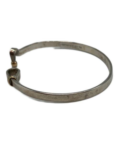 TIFFANY & Co.（ティファニー）TIFFANY & Co. (ティファニー) ラブノット フック&アイバングルの古着・服飾アイテム