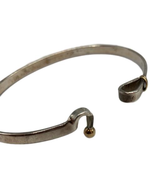 TIFFANY & Co.（ティファニー）TIFFANY & Co. (ティファニー) ラブノット フック&アイバングルの古着・服飾アイテム