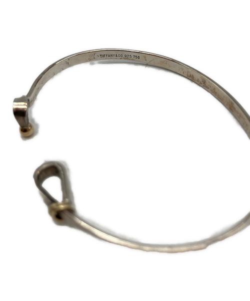 TIFFANY & Co.（ティファニー）TIFFANY & Co. (ティファニー) ラブノット フック&アイバングルの古着・服飾アイテム