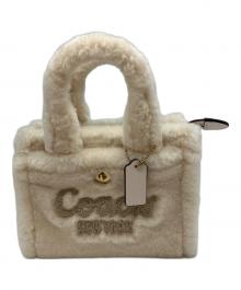 COACH（コーチ）の古着「2026年発売モデル カーゴ ボアハンドバッグ」｜ホワイト