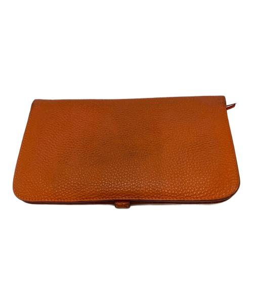HERMES（エルメス）HERMES (エルメス) ドゴンGM D 長財布 オレンジの古着・服飾アイテム