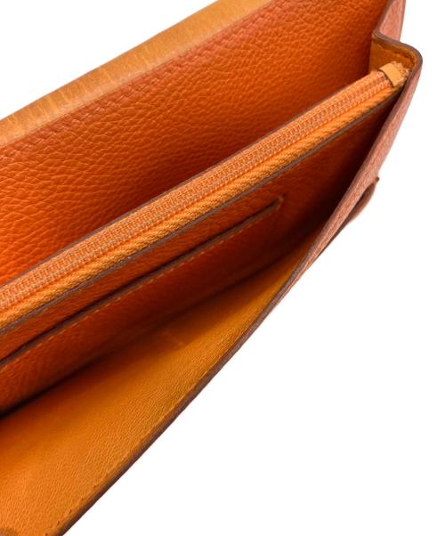 HERMES（エルメス）HERMES (エルメス) ドゴンGM D 長財布 オレンジの古着・服飾アイテム