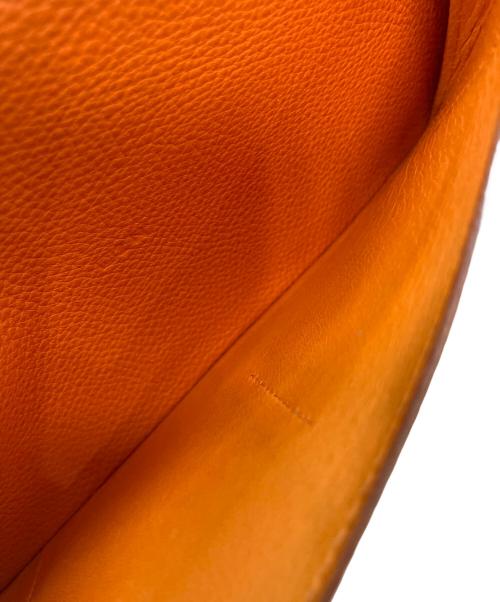 HERMES（エルメス）HERMES (エルメス) ドゴンGM D 長財布 オレンジの古着・服飾アイテム