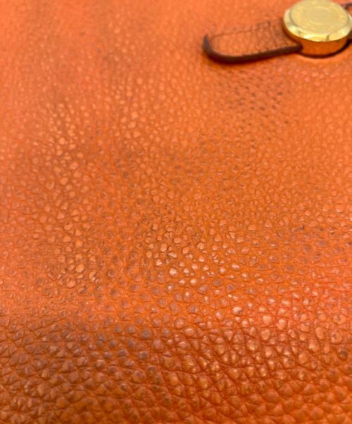 HERMES（エルメス）HERMES (エルメス) ドゴンGM D 長財布 オレンジの古着・服飾アイテム