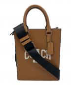 COACHコーチ）の古着「ディラン トート・ヴァーシティ トートバッグ」｜ブラウン