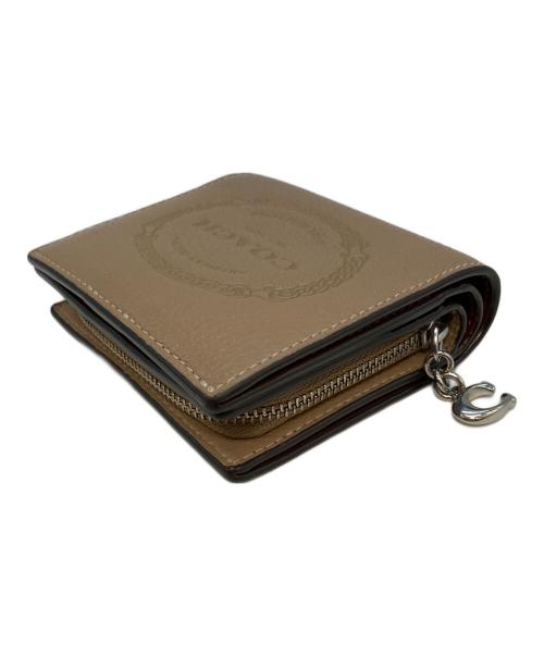 COACH（コーチ）COACH (コーチ) F2344 2つ折り財布 ブラウンの古着・服飾アイテム