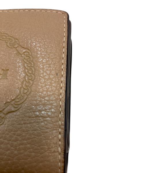 COACH（コーチ）COACH (コーチ) F2344 2つ折り財布 ブラウンの古着・服飾アイテム