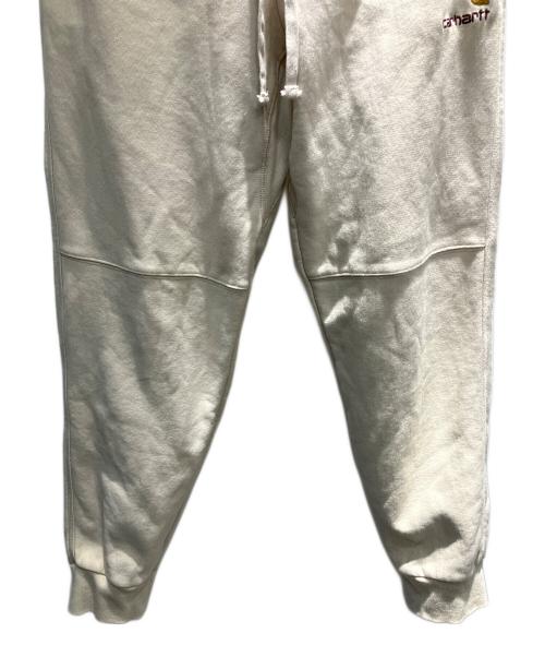CarHartt（カーハート）CarHartt (カーハート) アメリカンスクリプトジョギングスウェットパンツ アイボリー サイズ:Mの古着・服飾アイテム