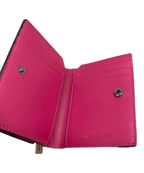 MICHAEL KORS（マイケルコース）MICHAEL KORS (マイケルコース) COOPER スナップ カードケース ダブル フォリオ ウォレット 2つ折り財布 ショッキングピンクの古着・服飾アイテム