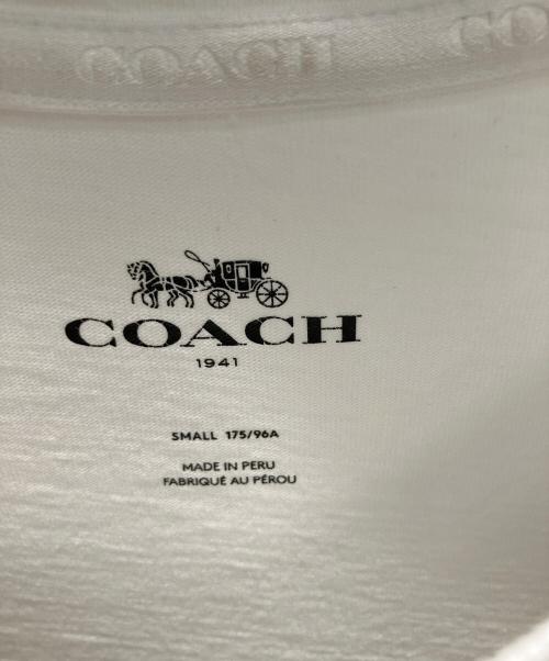 COACH（コーチ）COACH (コーチ) シグネチャー 恐竜 レキシー 半袖カットソー ホワイト サイズ:Sの古着・服飾アイテム
