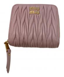 MIU MIU（ミュウミュウ）の古着「2つ折り財布」｜ピンク
