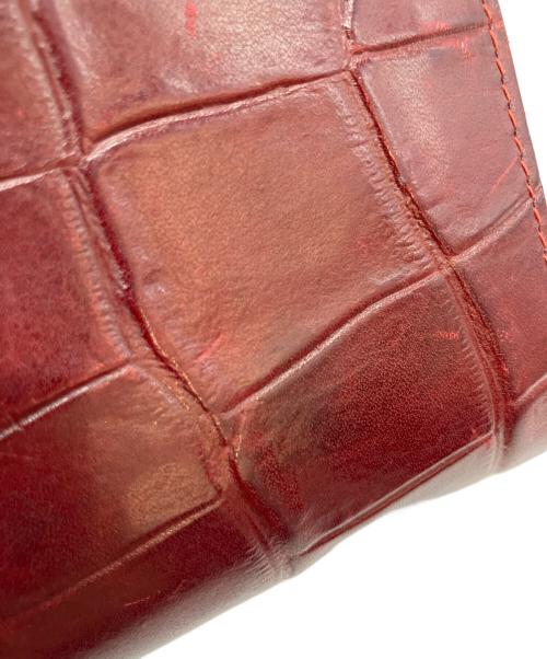 IL BISONTE（イル ビゾンテ）IL BISONTE (イル ビゾンテ) 2つ折り財布 レッドの古着・服飾アイテム