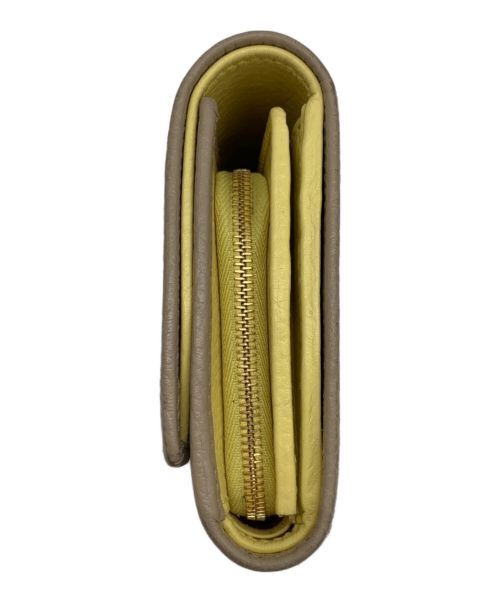 GUCCI（グッチ）GUCCI (グッチ) ダブルGミディアムウォレット ベージュ×イエローの古着・服飾アイテム