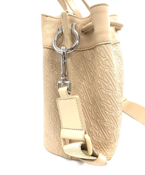 COLE HAAN（コールハーン）COLE HAAN (コールハーン) キルテッド ロゴ スモール バケット ベージュの古着・服飾アイテム