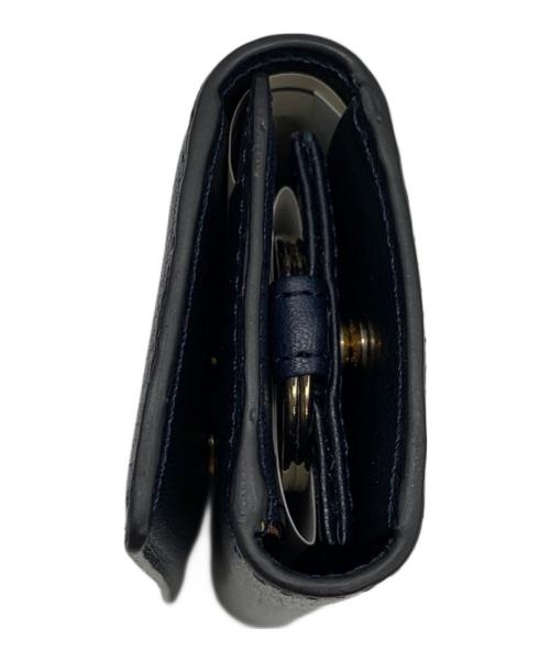 PAUL SMITH（ポールスミス）Paul Smith (ポールスミス) シティエンボスキーケース ネイビーの古着・服飾アイテム