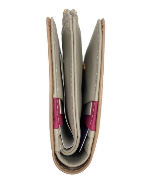 PAUL SMITH（ポールスミス）Paul Smith (ポールスミス) 2つ折り財布 ベージュの古着・服飾アイテム