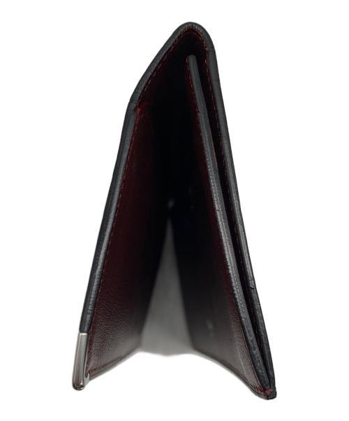 Cartier（カルティエ）Cartier (カルティエ) 二つ折り長財布 ブラック×レッドの古着・服飾アイテム