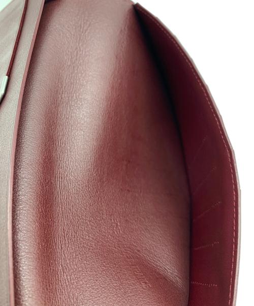 Cartier（カルティエ）Cartier (カルティエ) 二つ折り長財布 ブラック×レッドの古着・服飾アイテム