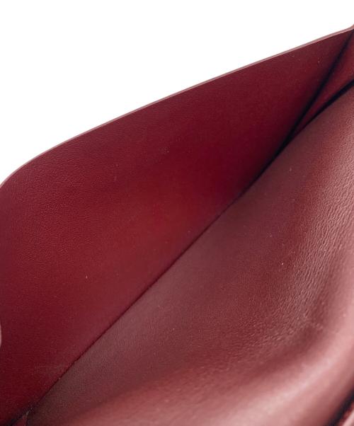 Cartier（カルティエ）Cartier (カルティエ) 二つ折り長財布 ブラック×レッドの古着・服飾アイテム