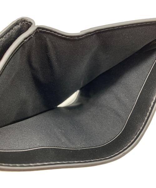 COACH（コーチ）COACH (コーチ) 2つ折り財布 ブラウン×ブラックの古着・服飾アイテム