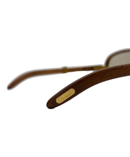 Cartier（カルティエ）Cartier (カルティエ) ウッドテンプルサングラス ブラウン×ゴールド サイズ:56□19 テンプル135の古着・服飾アイテム