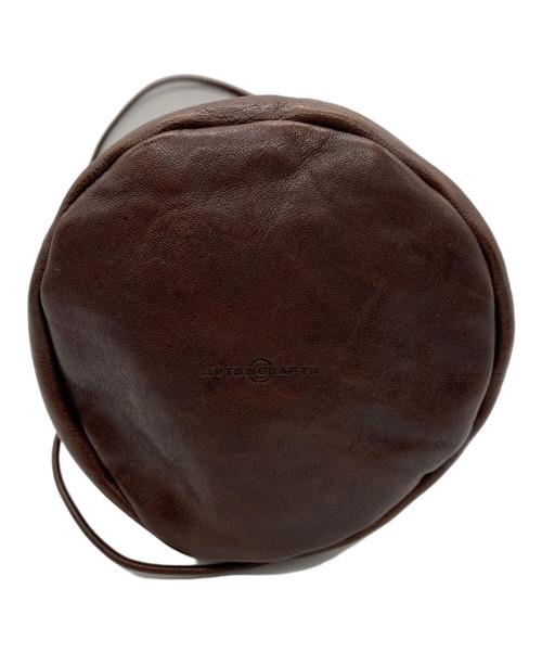 arts&crafts（アーツアンドクラフツ）ARTS&CRAFTS (アーツアンドクラフツ) 巾着ショルダーバッグ ブラウンの古着・服飾アイテム