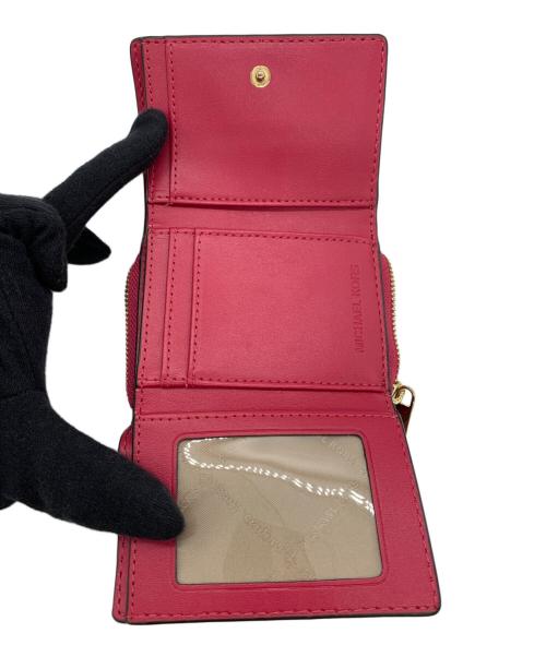 MICHAEL KORS（マイケル・コース）MICHAEL KORS (マイケル・コース) 3つ折り財布 ショッキングピンクの古着・服飾アイテム