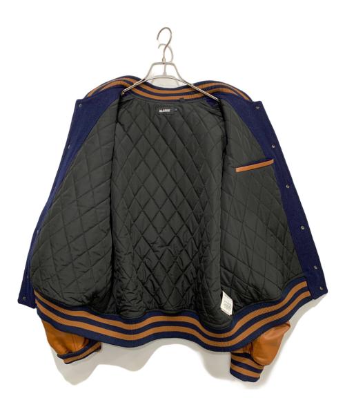 X-LARGE（エクストララージ）X-LARGE (エクストララージ) スタジャン ブラウン×ネイビー サイズ:Lの古着・服飾アイテム