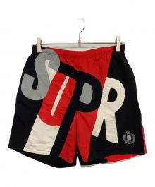 SUPREME（シュプリーム）の古着「Big Letter Water Short」｜レッド×ブラック