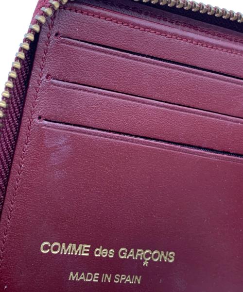 COMME des GARCONS（コムデギャルソン）COMME des GARCONS (コムデギャルソン) 2つ折り財布 レッドの古着・服飾アイテム