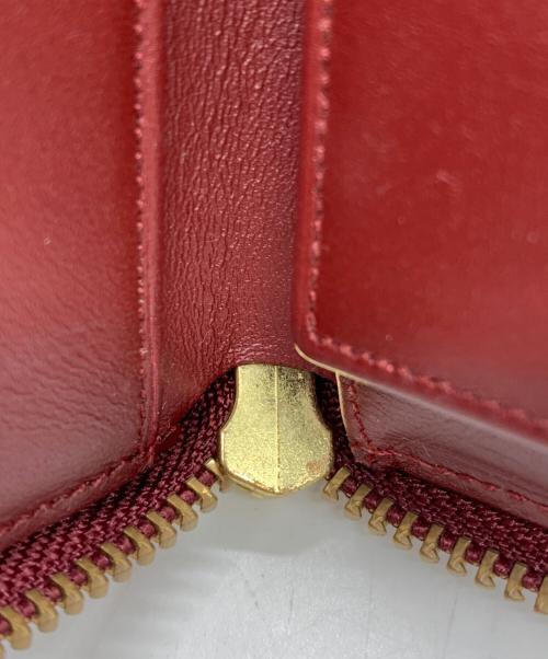 COMME des GARCONS（コムデギャルソン）COMME des GARCONS (コムデギャルソン) 2つ折り財布 レッドの古着・服飾アイテム