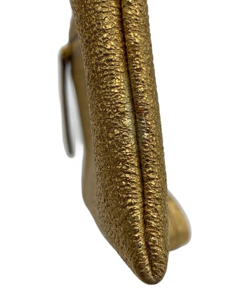 ANYA HINDMARCH（アニヤ・ハインドマーチ）ANYA HINDMARCH (アニヤ・ハインドマーチ) ハンドポーチ ゴールドの古着・服飾アイテム